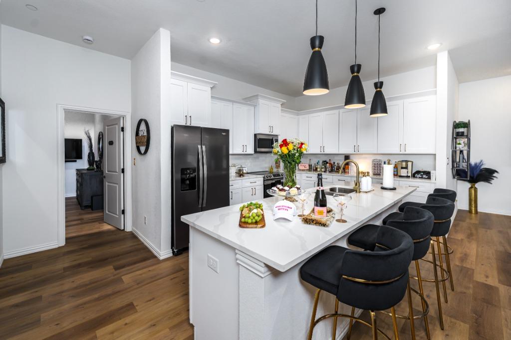 Full gourmet kitchen at Haute Hideaway corporate rental — meal prep for extended business stays